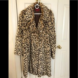 Head turning faux leopard coat